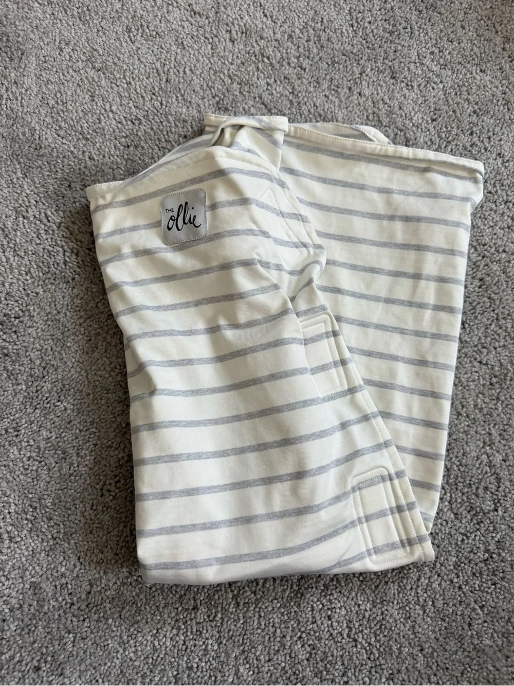 Ollie World Swaddle designed for newborn calming and sleep.